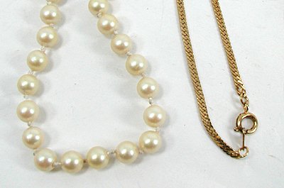 Bargain barn imitation pearls and gold necklaces
