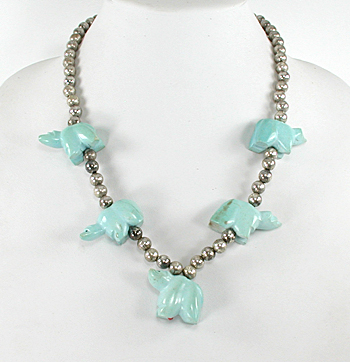 silver bead necklace 21 inches long with 5 turquoise  bears