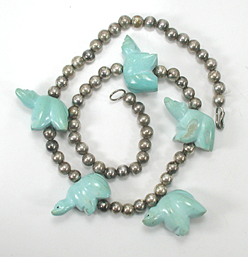 silver bead necklace 21 inches long with 5 turquoise  bears