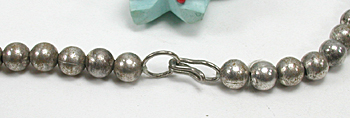 silver bead necklace 21 inches long with 5 turquoise  bears