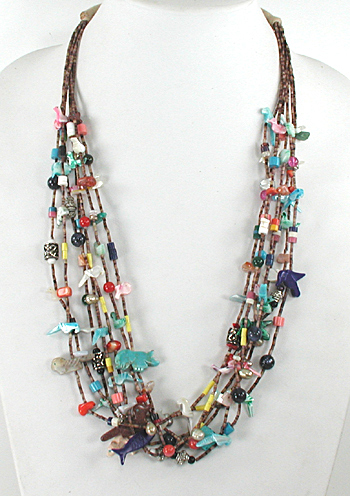 Seven strand treasure necklace 26 inches long with faux squaw wrap