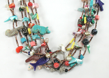 Seven strand treasure necklace 26 inches long with faux squaw wrap