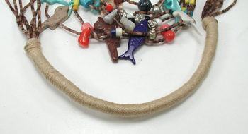 Seven strand treasure necklace 26 inches long with faux squaw wrap