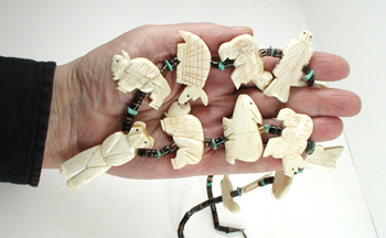 Bone animals and pen shell heishi necklace 30 inches long