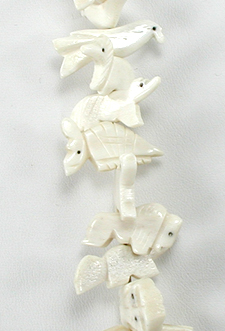 Stacked Animals necklace of bone with faux squaw wrap 30 inches long