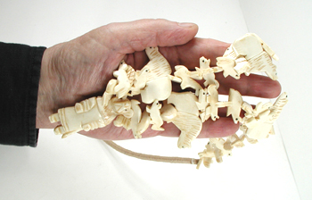 Stacked Animals necklace of bone with faux squaw wrap 30 inches long