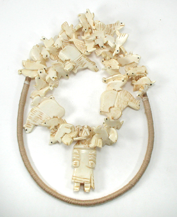 Stacked Animals necklace of bone with faux squaw wrap 30 inches long