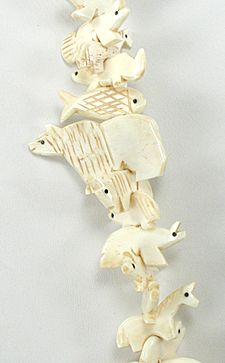 Stacked Animals necklace of bone with faux squaw wrap 30 inches long