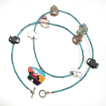 seven bears and two buffalo necklace with turquoise heishi 25 inches long