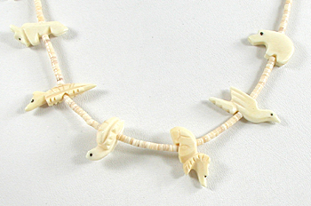 Bone animals and melon shell heishi necklace 26 inches long