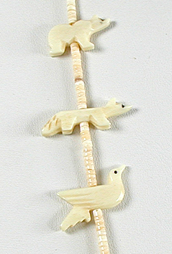 Bone animals and melon shell heishi necklace 26 inches long