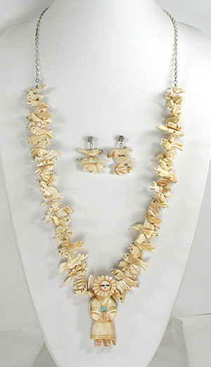 Stacked bone animals necklace 32 inches long with matching earrings