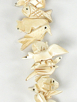 Stacked bone animals necklace 32 inches long with matching earrings