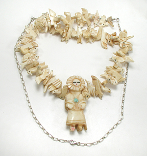 Stacked bone animals necklace 32 inches long with matching earrings