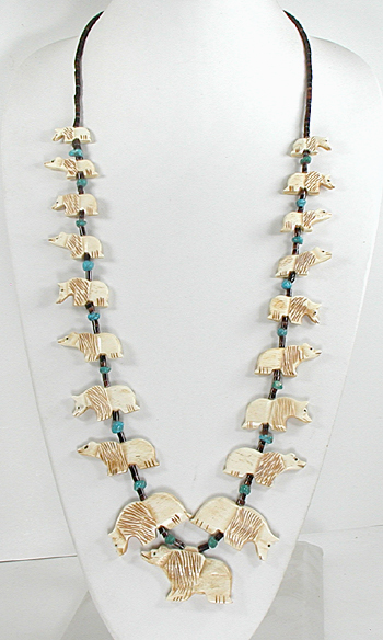 graduated bone bears necklace with turquoise nuggets on pen shell heishi 33 inches long