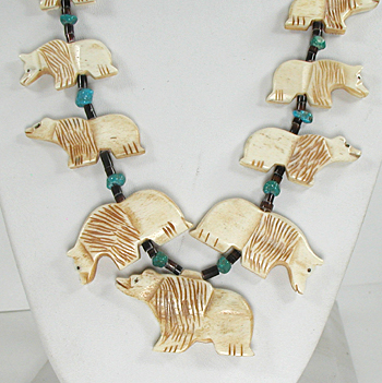 graduated bone bears necklace with turquoise nuggets on pen shell heishi 33 inches long