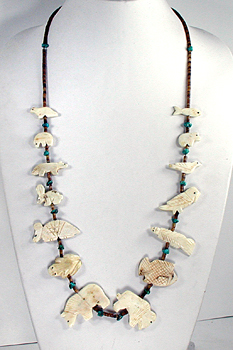 Bone animals, turquoise nuggets, and pen shell heishi necklace 32 inches long