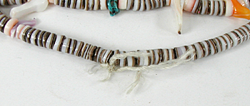 33 inch long bird necklace of shell birds and olive shell heishi, excellent condition