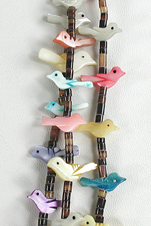 30 inch long 3-strand bird necklace of shell birds and olive shell heishi, excellent condition