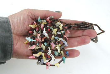30 inch long 3-strand bird necklace of shell birds and olive shell heishi, excellent condition