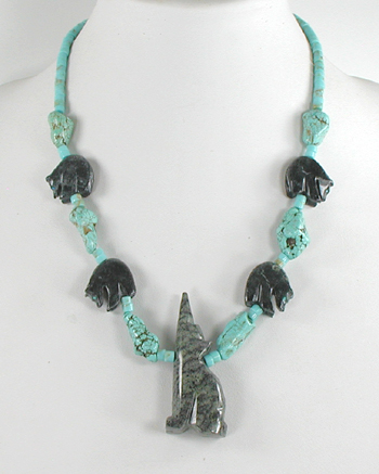 turquoise heishi and nugget necklace 21 inches long with marble coyote and bears, excellent condition