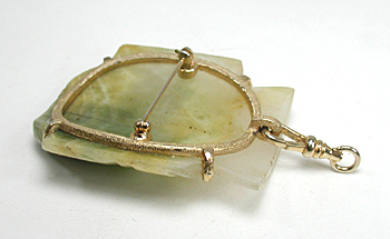 jade or jadeite mask or face pin pendant