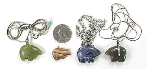 lot of four bear pendants