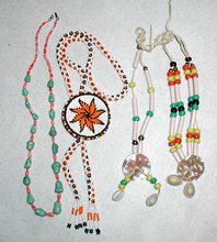 Bargain Barn lot of three beaded necklaces and a bolo tie