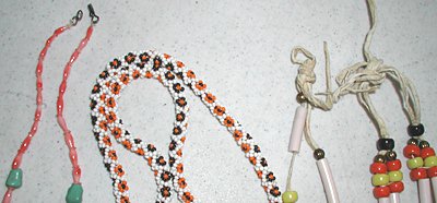 Bargain Barn lot of three beaded necklaces and a bolo tie