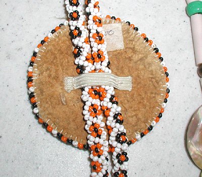 Bargain Barn lot of three beaded necklaces and a bolo tie
