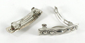 one pair stamped sterling silver Repousse barrettes