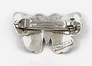 Authentic Native American stamped sterling silver and turquoise Butterfly hair barrette by Navajo silversmith June Delgarito