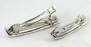 Authentic Native American pair of sterling silver and turquoise hair barrettes by Navajo silversmith Paul Largo
