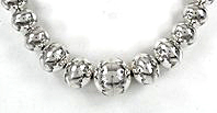 Native American Sterling Silver stamped graduated bead necklace by Navajo Jeffrey Nelsons