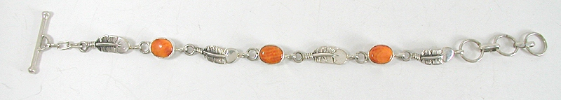 New Old Stock bracelet Sterling Silver and orange and purple spiny oyster link bracelet by Navajo artist Teddy Goodluck, Jr.