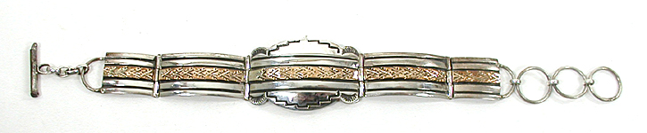 sterling silver overlay link bracelet with 12K gold fill 6 to 7 inches