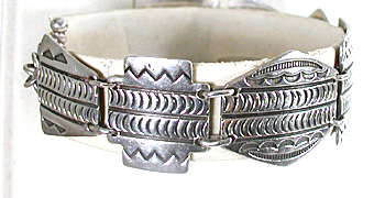 stamped sterling silver link bracelet by Kewa silversmith Raymond Coriz