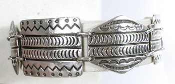 stamped sterling silver link bracelet by Kewa silversmith Raymond Coriz