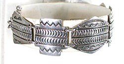 stamped sterling silver link bracelet by Kewa silversmith Raymond Coriz