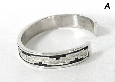 Authentic Native American Sterling Silver Rug or rug pattern cuff bracelet by Navajo silversmith Dan Jackson