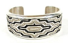 Authentic Native American Sterling Silver rug pattern cuff bracelet by Navajo silversmith Dan Jackson
