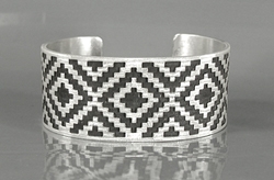 Authentic Native American Sterling Silver rug pattern cuff bracelet by Navajo silversmith Roland H. Begay