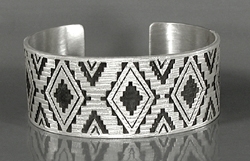 Authentic Native American Sterling Silver rug pattern cuff bracelet by Navajo silversmith Roland H. Begay