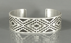 Authentic Native American Sterling Silver rug pattern cuff bracelet by Navajo silversmith Roland H. Begay