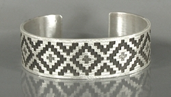 Authentic Native American Sterling Silver rug pattern cuff bracelet by Navajo silversmith Roland H. Begay