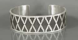 Authentic Native American Sterling Silver rug pattern cuff bracelet by Navajo silversmith Roland H. Begay