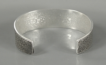 Authentic Native American Sterling Silver Tufa Cast Buffalo cuff bracelet by Navajo silversmith Darryl Dean Begay