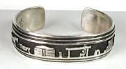 Hand made Native American Indian Jewelry; Navajo Sterling Silver Storyteller Bracelet
