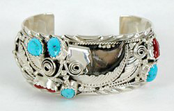 Native American Navajo Sterling Silver bear claw bracelet with turquoise and coral
