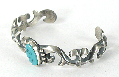 Authentic Native American tufa cast sterling silver and Turquoise Bracelet by Navajo artisan Harrison Bitsui